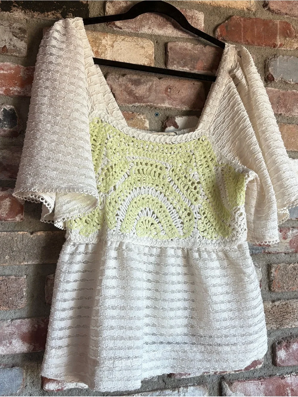 Anthropologie Cream Knit Peplum Top with Lime Crochet Yoke